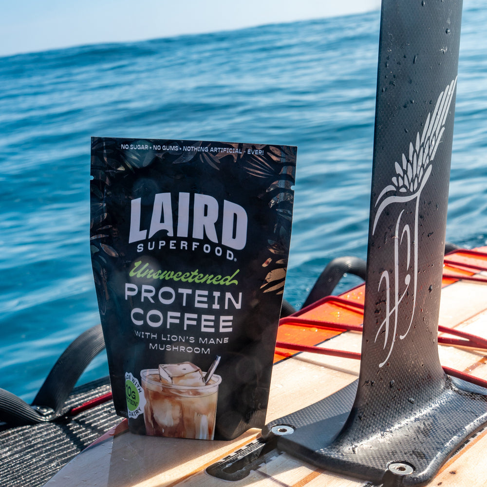Laird Unsweetened Protein Coffee with Lion's Mane by Organax Ltd in a 150g package showing the product and label.