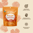 Four Sigmatic Organic Focus Mushroom Blend packaging showing the 60g jar with labels highlighting natural mushroom ingredients for mental clarity.