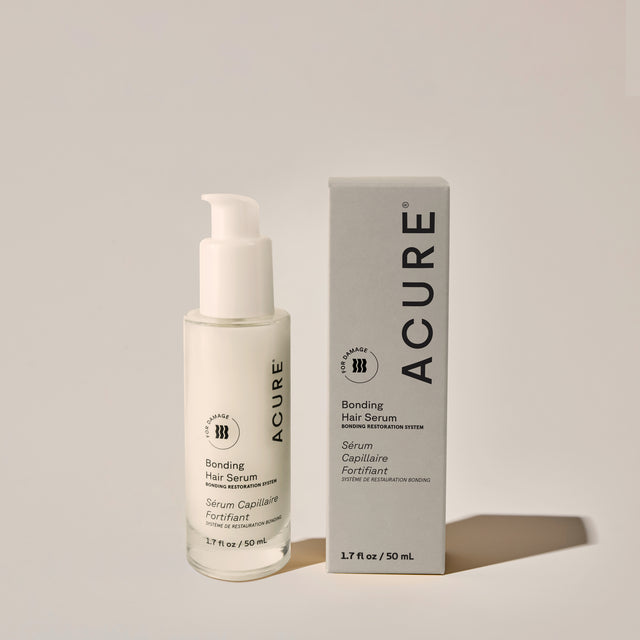 ACURE Revitabond Smooth Serum 50ml from Organax Ltd, a hair care strengthening and smoothing treatment in a bottle with a box.