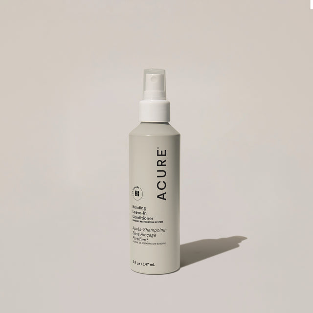ACURE Revitabond Leave-In Spray by Organax Ltd, 147ml, for bond repair and detangling in hair care.