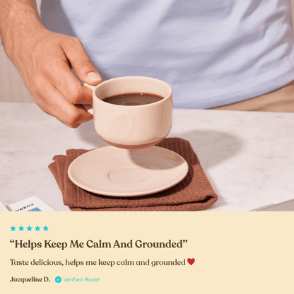 Four Sigmatic Organic Calm Balance instant coffee sachets by Organax Ltd, featuring calming herbal blend in individual packaging.
