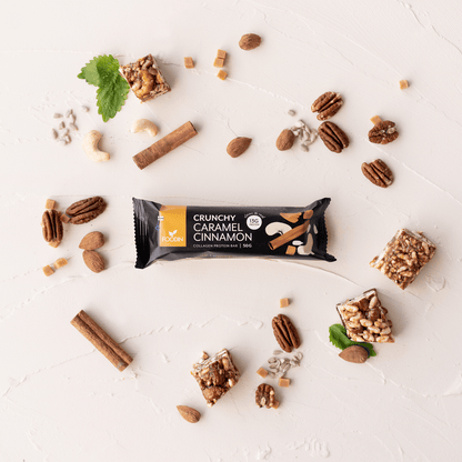 Organic Collagen Protein Bar by Foodin with caramel and cinnamon flavor, showing a 50g bar and packaging in the image.