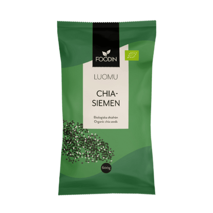 Organic chia seeds in a 600g package by Organax Ltd, showing a clear view of the printed label and seed texture.