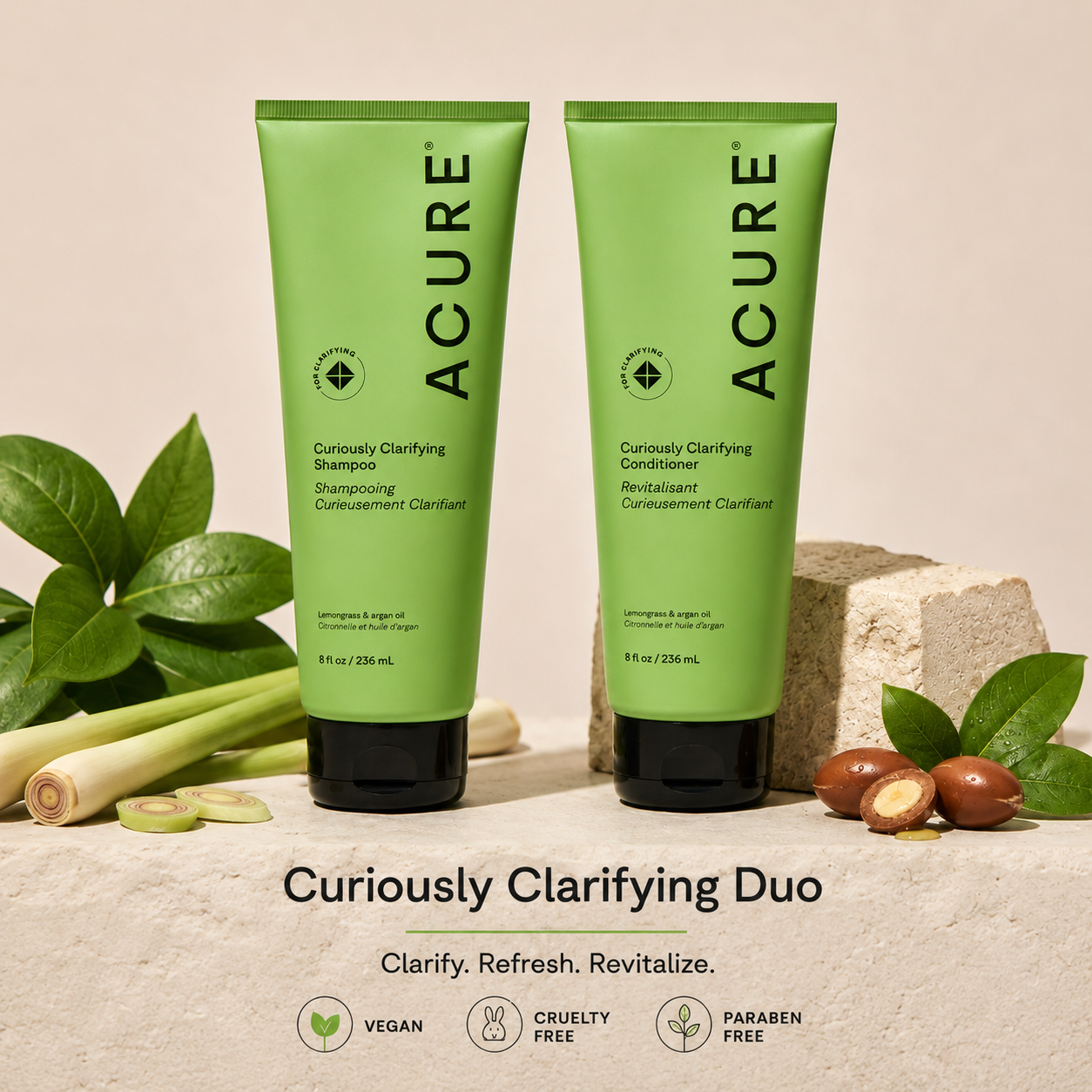 ACURE Curiously Clarifying Shampoo and Conditioner bundle by Organax Ltd, featuring bottles with labeled product packaging.