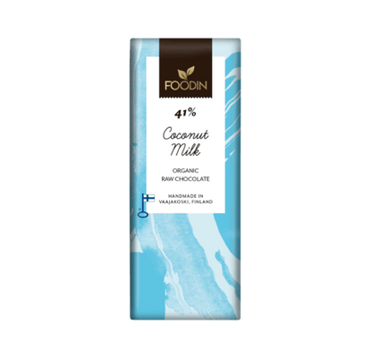 Organic raw chocolate coconut milk in a 40g package by Foodin, featuring rich coconut and cocoa ingredients in a natural setting.