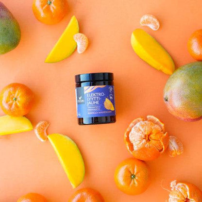 Electrolyte powder in mango-mandarin flavor by Organax Ltd, showing the 120g packaging with mango and mandarin fruits.