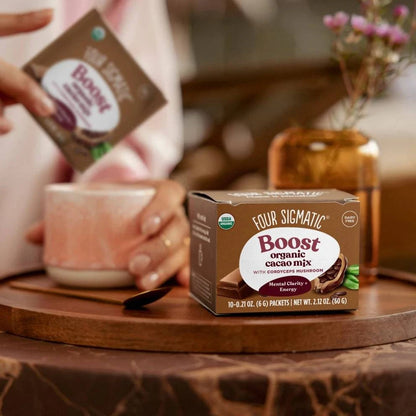 Organic Boost Cacao with Cordyceps mushroom in 10 sachets, featuring a package with cacao and mushroom imagery.