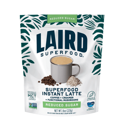 Laird Reduced Sugar Instant Latte with Adaptogens in 227g pack, showcasing a ready-to-mix coffee beverage with herbal infusions