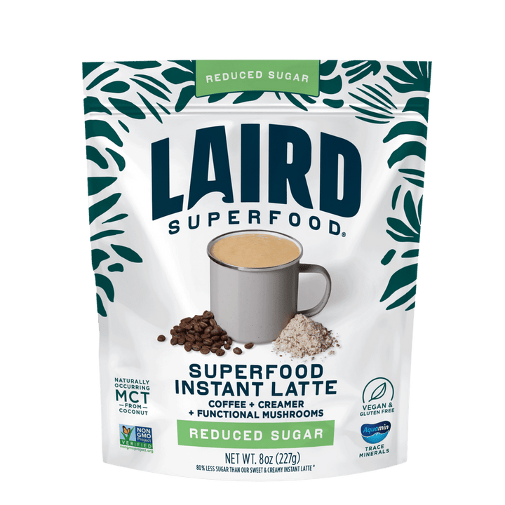 Laird Reduced Sugar Instant Latte with Adaptogens in 227g pack, showcasing a ready-to-mix coffee beverage with herbal infusions