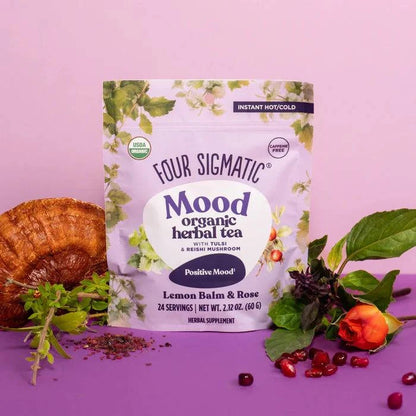 Organic Four Sigmatic Mood Herbal Tea in a 60g package, featuring a calming blend of herbs displayed in a mug.