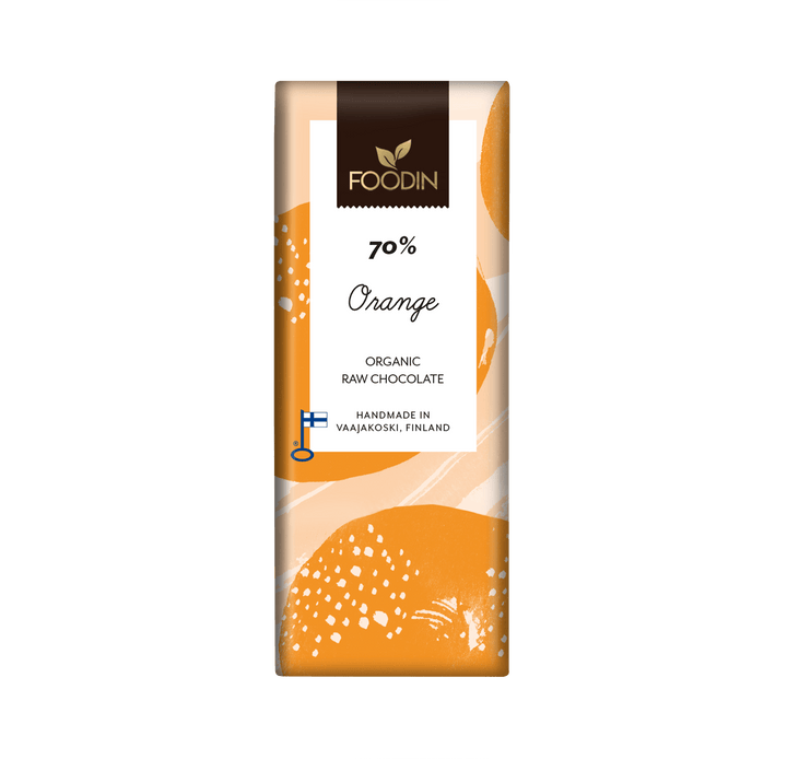 Organic raw chocolate orange bar by Foodin with 70% cocoa content, displayed alongside a fresh orange.