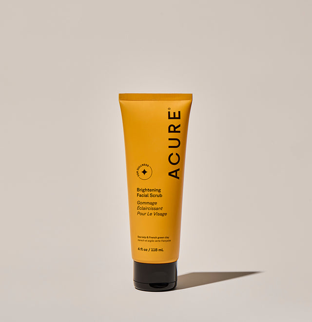 Brightening facial scrub in a 118ml tube from ACURE by Organax Ltd, featuring natural exfoliating ingredients.