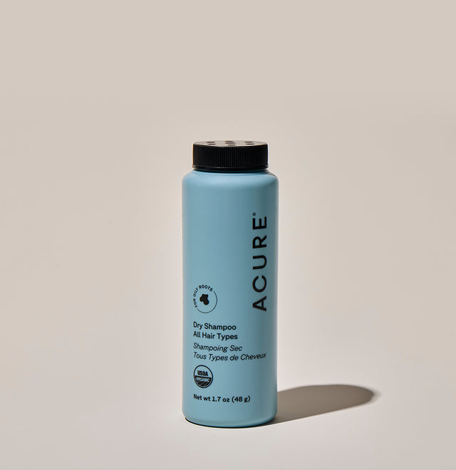 Dry shampoo for all hair types by Acure with rosemary and arrowroot, 48g, in a white spray bottle.