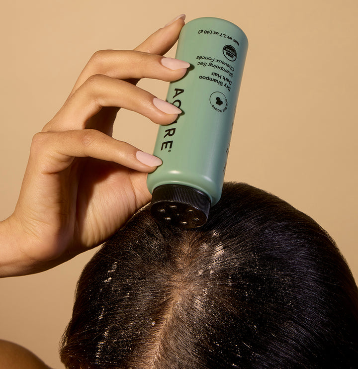 Dry shampoo for brunette to dark hair by Acure with cocoa and arrowroot, in a 48g container, ideal for freshening hair between washes.