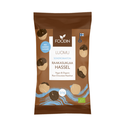 Organic raw chocolate with hazelnuts by Organax Ltd, no added sugar, 50g bar with a rich chocolate and hazelnut appearance.