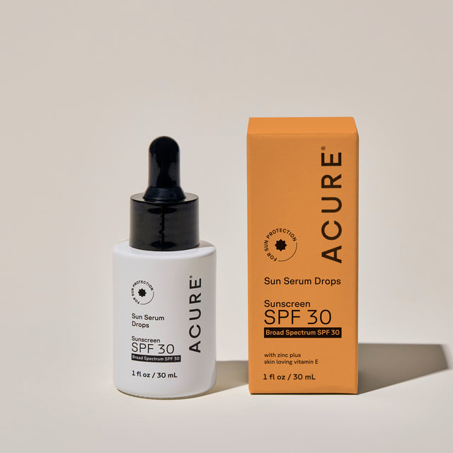 ACURE Sun Serum Drops SPF 30 in a 30ml bottle, featuring a clear liquid sun protection serum with dropper applicator.