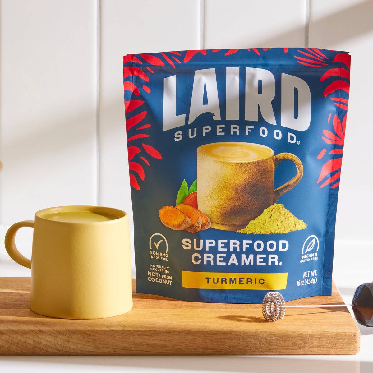 Organic Laird Turmeric Superfood Creamer in 227g jar, featuring vibrant turmeric powder for healthy, flavorful drinks and recipes.