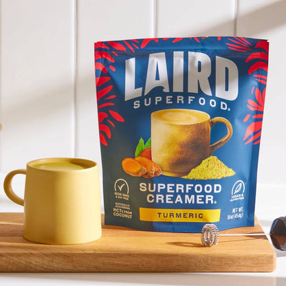 Organic Laird Turmeric Superfood Creamer in 227g jar, featuring vibrant turmeric powder for healthy, flavorful drinks and recipes.