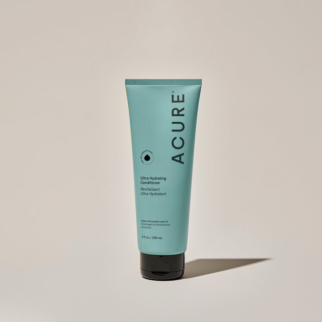 ACURE Ultra Hydrating Conditioner by Organax Ltd in 236ml bottle, showcasing sleek packaging and product details.