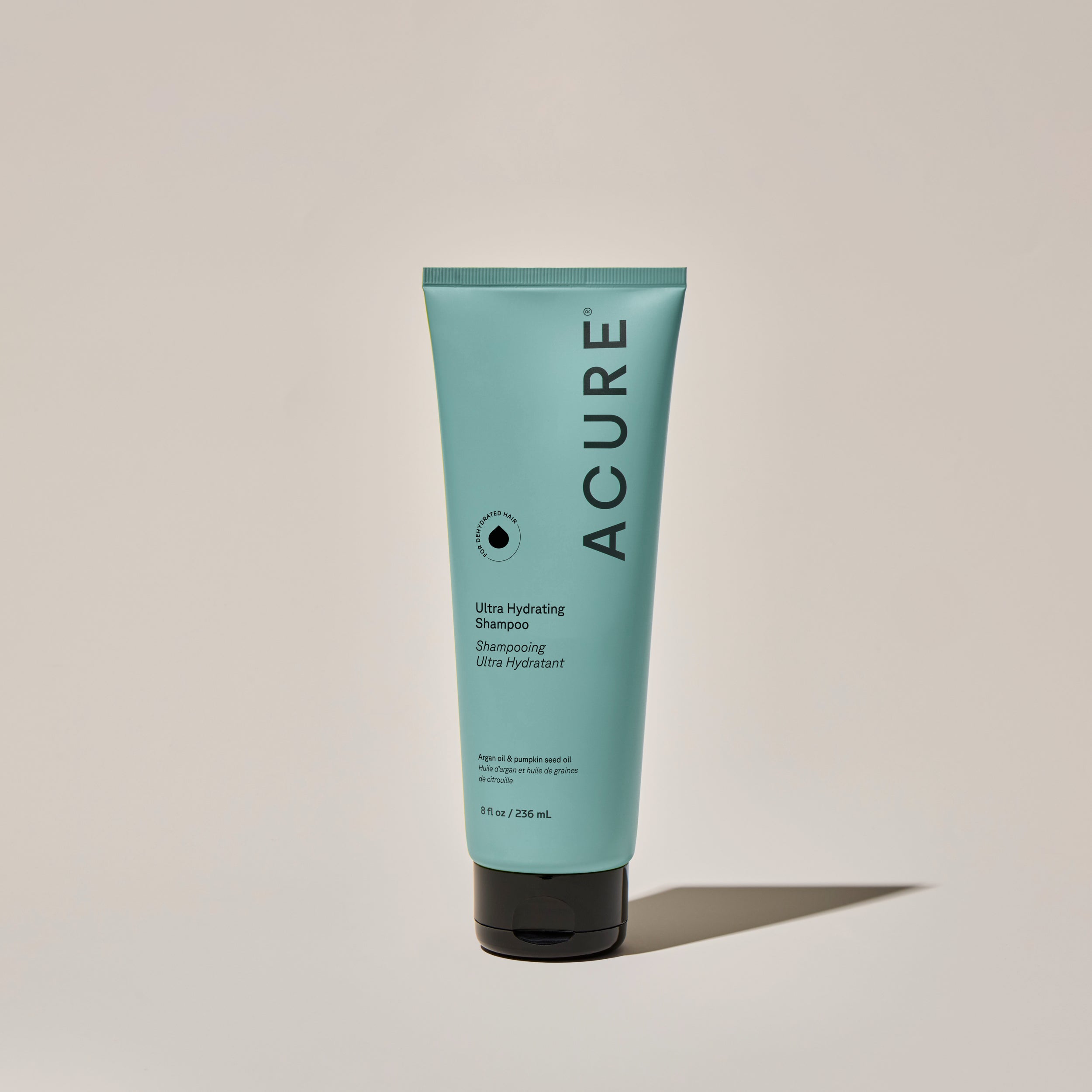 Organic ACURE Ultra Hydrating Shampoo and Conditioner bundle by Organax Ltd, featuring moisturizing hair care products in square bottles.