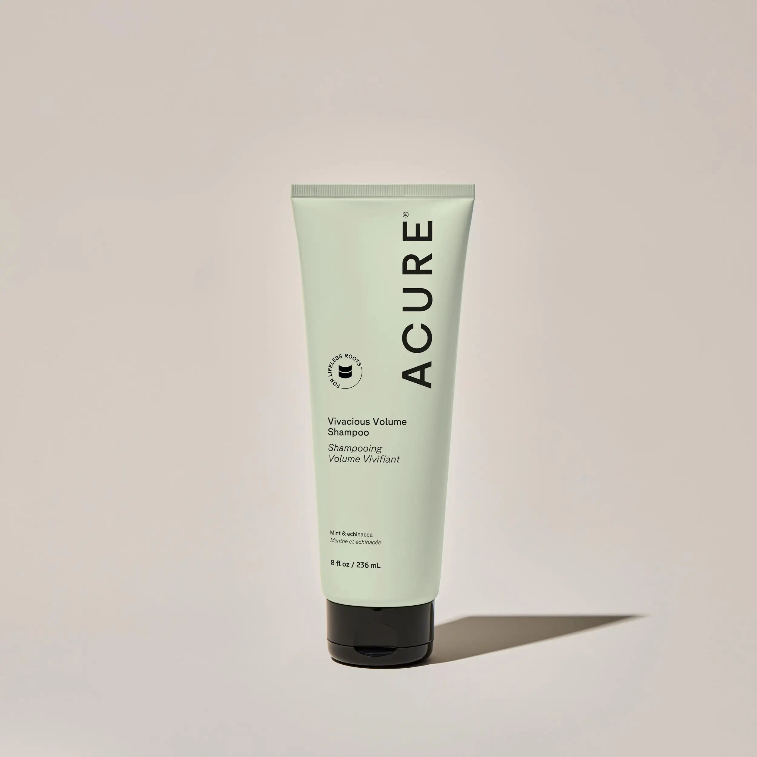 ACURE Vivacious Volume Shampoo and Conditioner bundle by Organax Ltd, featuring two square bottles with vibrant labels for volumizing hair care.