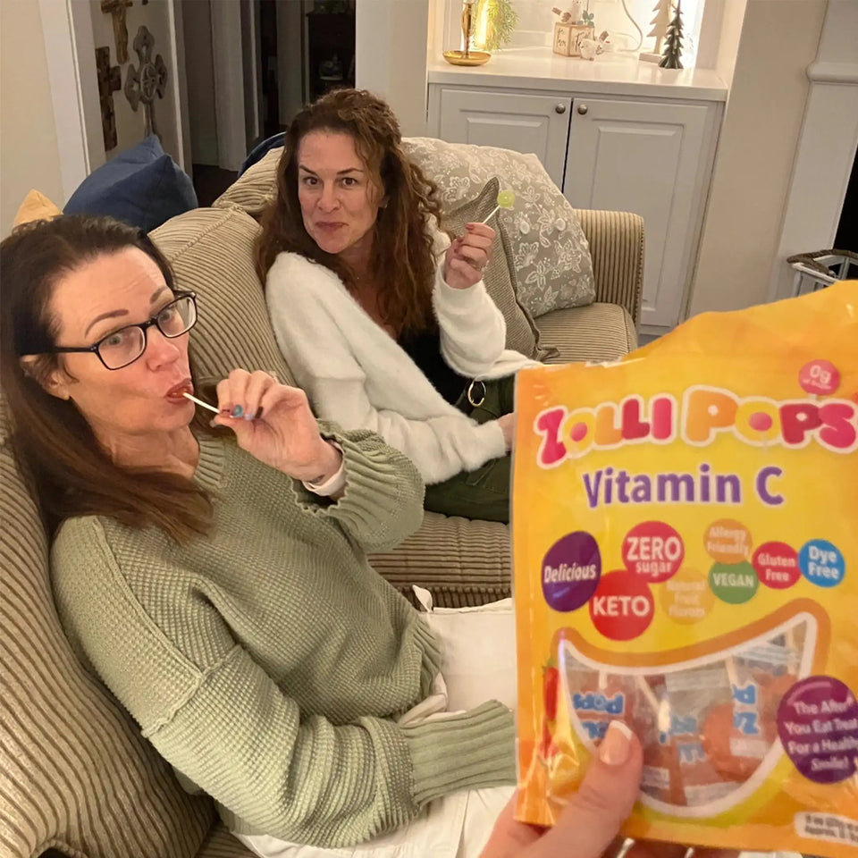 Vitamin C sugar-free Zollipops lollipops by Organax Ltd in a 227g (8oz) package, featuring colorful, fruit-flavored superfood treats.