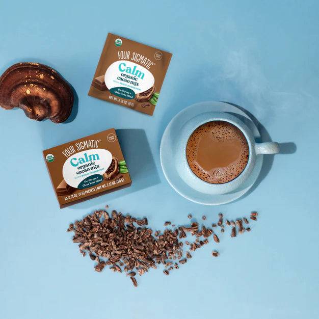 Organic Calm Cacao with Reishi Mushroom sachets from Organax Ltd, showing the packet top and product branding.