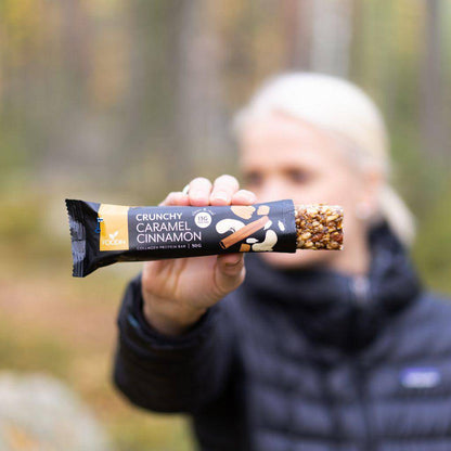 Organic Collagen Protein Bar by Foodin with caramel cinnamon flavor, showing a 50g bar on the packaging.