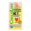 Childlife Essentials Vitamin K2 Berry supplement in a 12ml glass bottle, with the product packaging visible.