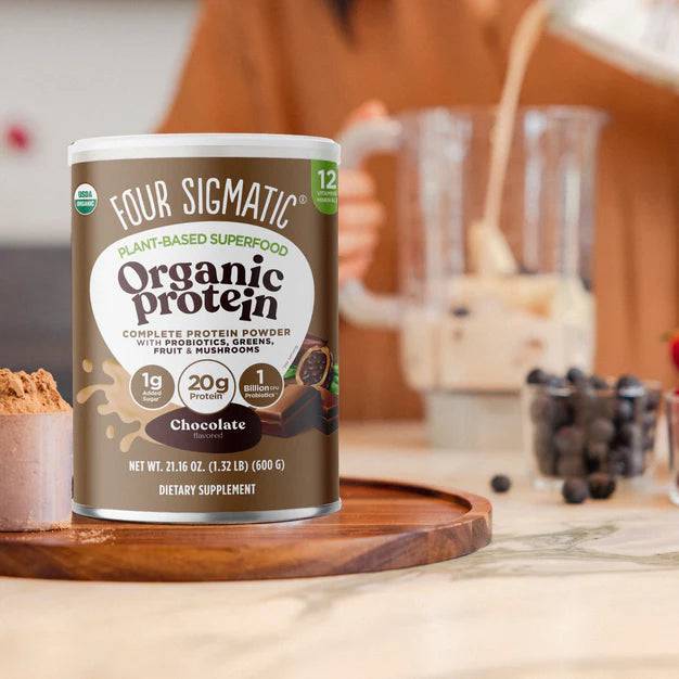 Organic Four Sigmatic Plant-Based Protein with Mushroom in creamy cacao flavor, showing the protein powder container and a prepared smoothie.