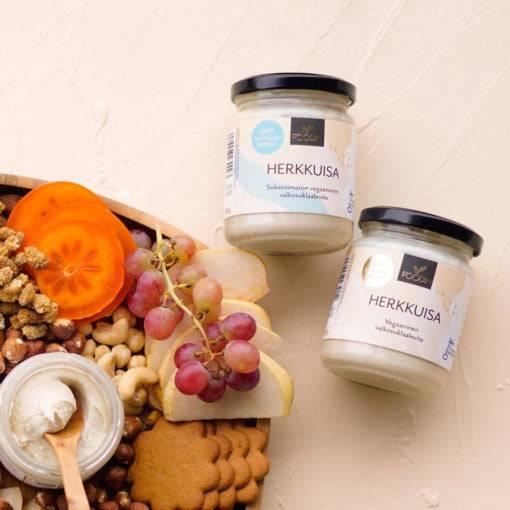 White chocolate spread by Organax Ltd, Herkkuisa, with no added sugar, in a 240g jar, featuring a smooth, creamy texture.